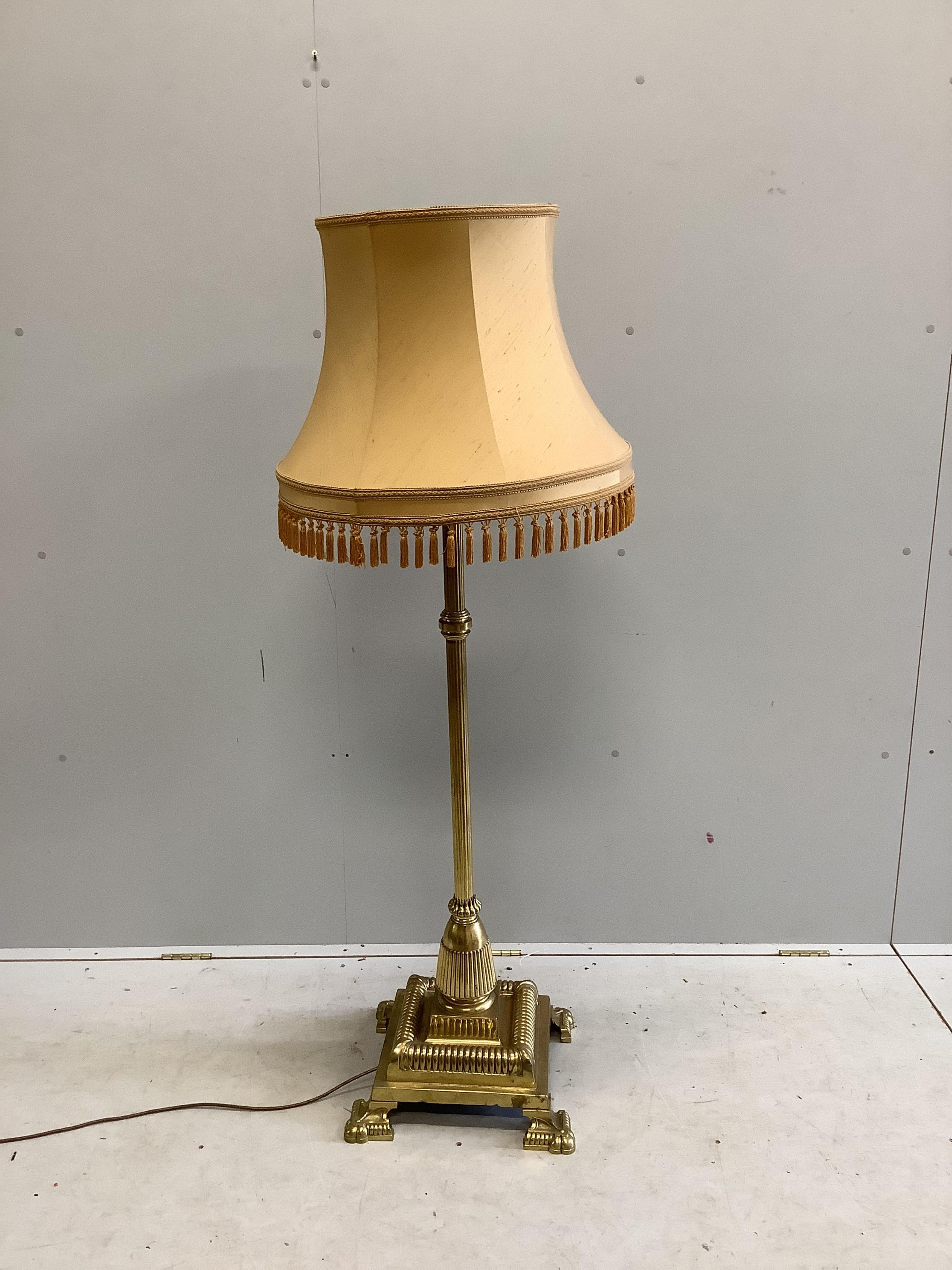 A brass telescopic standard lamp. Condition - fair